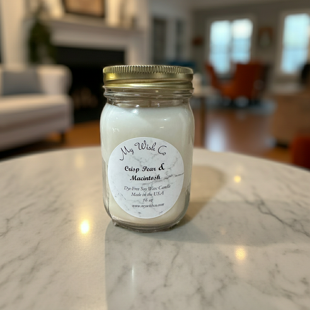 Jar of candle with a label on a marble surface in a home setting